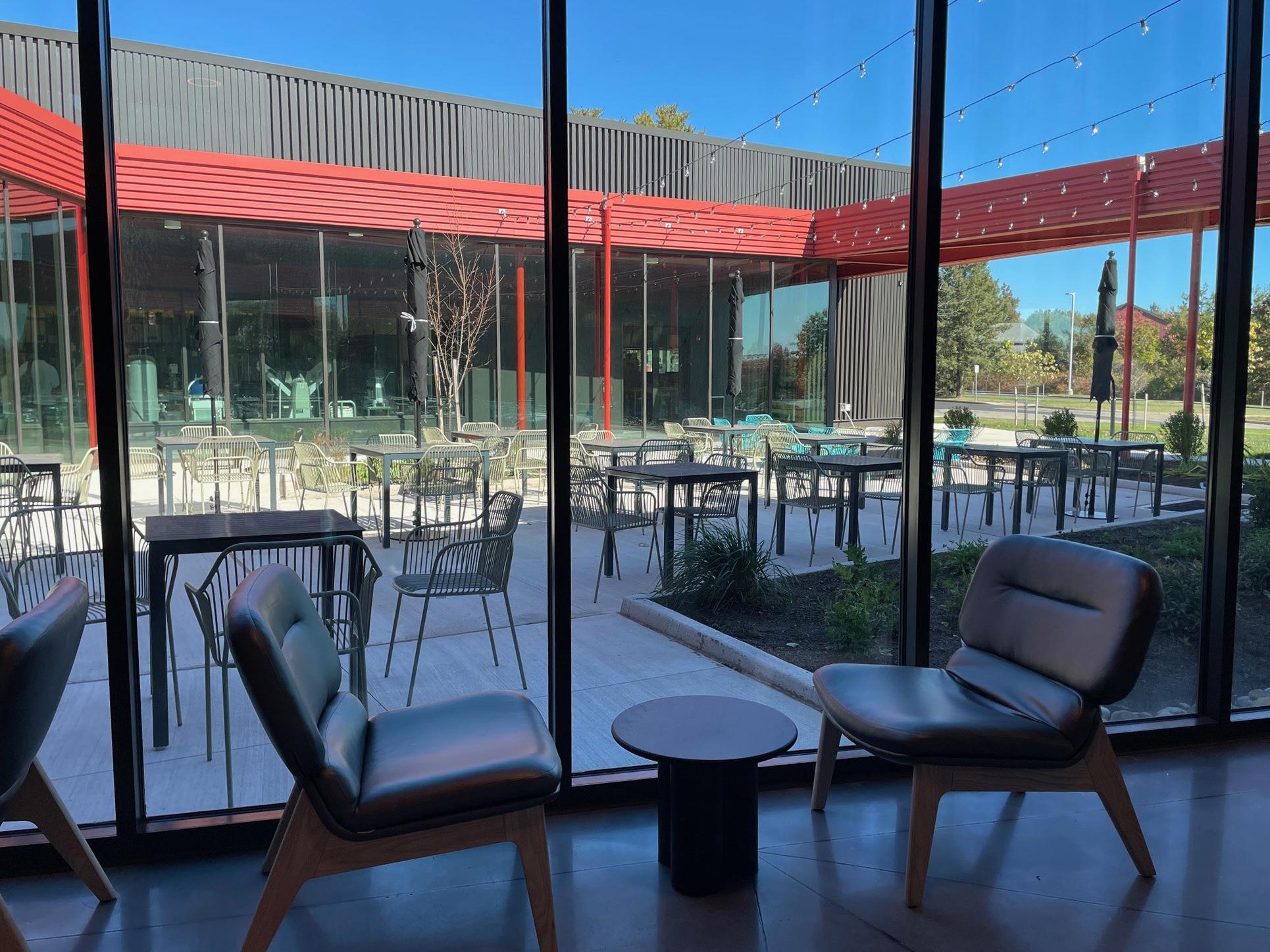 View of patio seating at the Hospitality Institute building